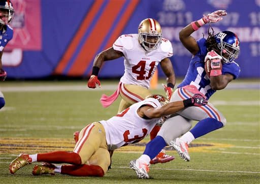 Gran duelo de Domingo por la Noche entre los San Francisco 49ers y los New York Giants. Checa las mejores tomas del triunfo de los Giants.