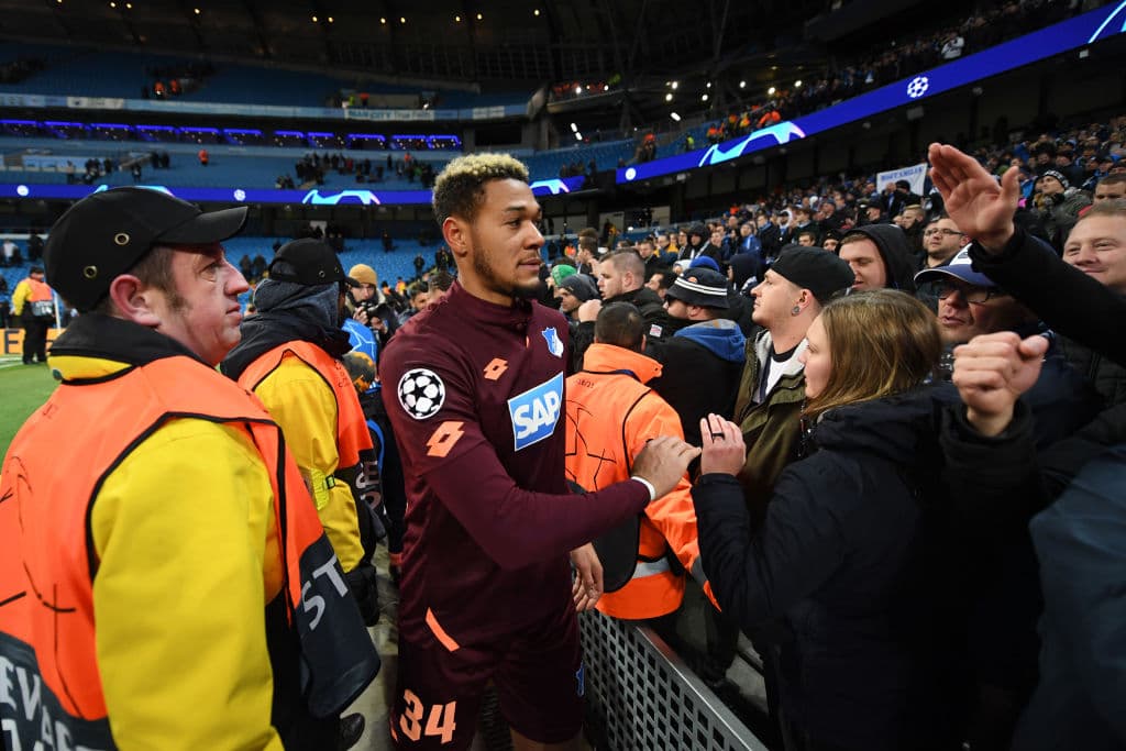 MANCHESTER, ENGLAND - DECEMBER 12: Joelinton of 1899 Hoffenheim with fans after the match during the UEFA Champions League Group F match between Manchester City and TSG 1899 Hoffenheim at Etihad Stadium on December 12, 2018 in Manchester, United Kingdom. (Photo by Gareth Copley/Getty Images)