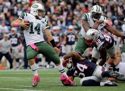 Tom Brady comandó a los Patriots a seguir inquebrantables en la NFL al derrotar a los Jets 30-23. Checa las mejores tomas de este encuentro de la Este AFC.