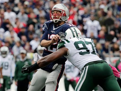 Tom Brady comandó a los Patriots a seguir inquebrantables en la NFL al derrotar a los Jets 30-23. Checa las mejores tomas de este encuentro de la Este AFC.