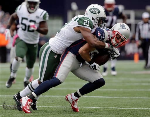 Tom Brady comandó a los Patriots a seguir inquebrantables en la NFL al derrotar a los Jets 30-23. Checa las mejores tomas de este encuentro de la Este AFC.