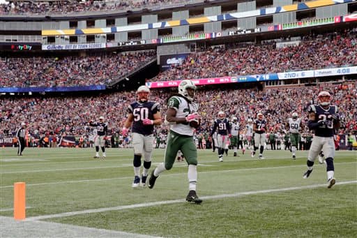 Tom Brady comandó a los Patriots a seguir inquebrantables en la NFL al derrotar a los Jets 30-23. Checa las mejores tomas de este encuentro de la Este AFC.