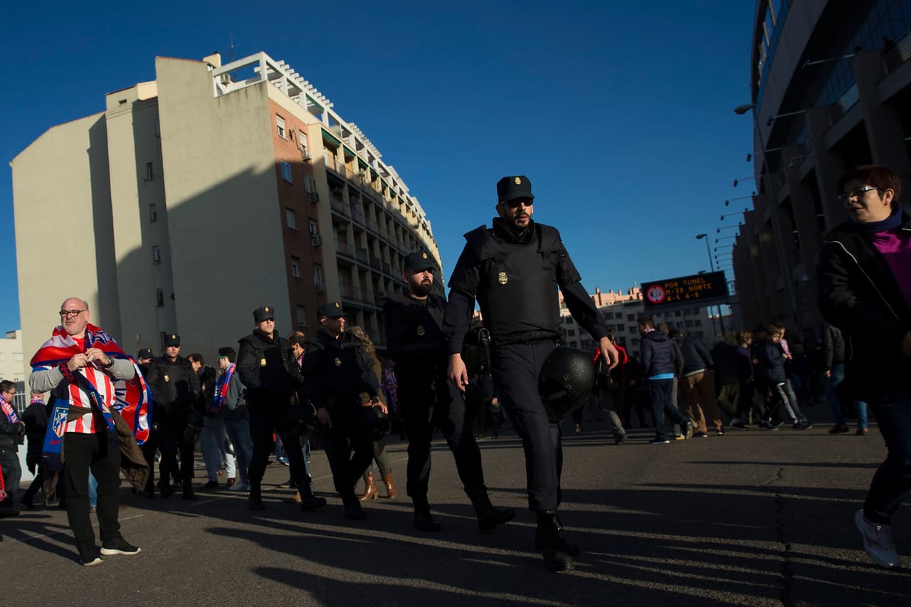 MADRID, SPAIN - APRIL 13: Riot police officers arrive before the UEFA Champions League quarter final, second leg match between Club Atletico de Madrid and FC Barcelona at the Vincente Calderon stadium outdoors on April 13, 2016 in Madrid, Spain. (Photo by Gonzalo Arroyo Moreno/Getty Images)