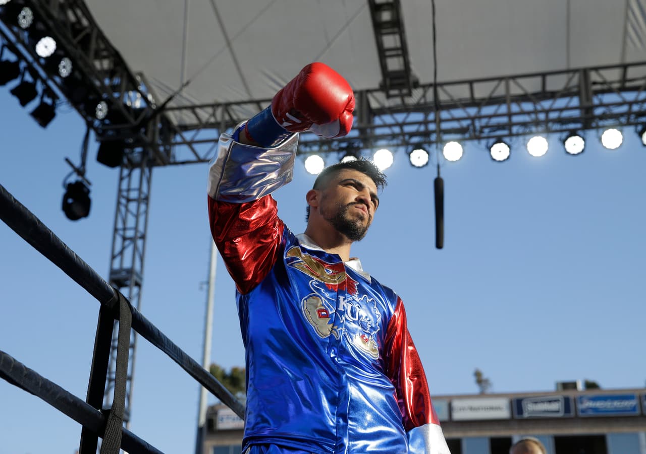 Victor Ortiz is introduced before a welterweight boxing match with Andre Berto, Saturday, April 30, 2016, in Carson, Calif. (AP Photo/Jae C. Hong)