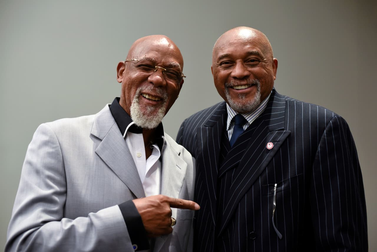 John Carlos, left, and Tommie Smith pose for a portrait at Georgetown University in Washington on Wednesday, Sept. 28, 2016. Smith and Carlos voiced their support for Colin Kaepernick and other athletes staging national anthem protests, 48 years after they raised their gloved fists on the medals stand in a symbolic protest at the Olympics. (AP Photo/Sait Serkan Gurbuz)