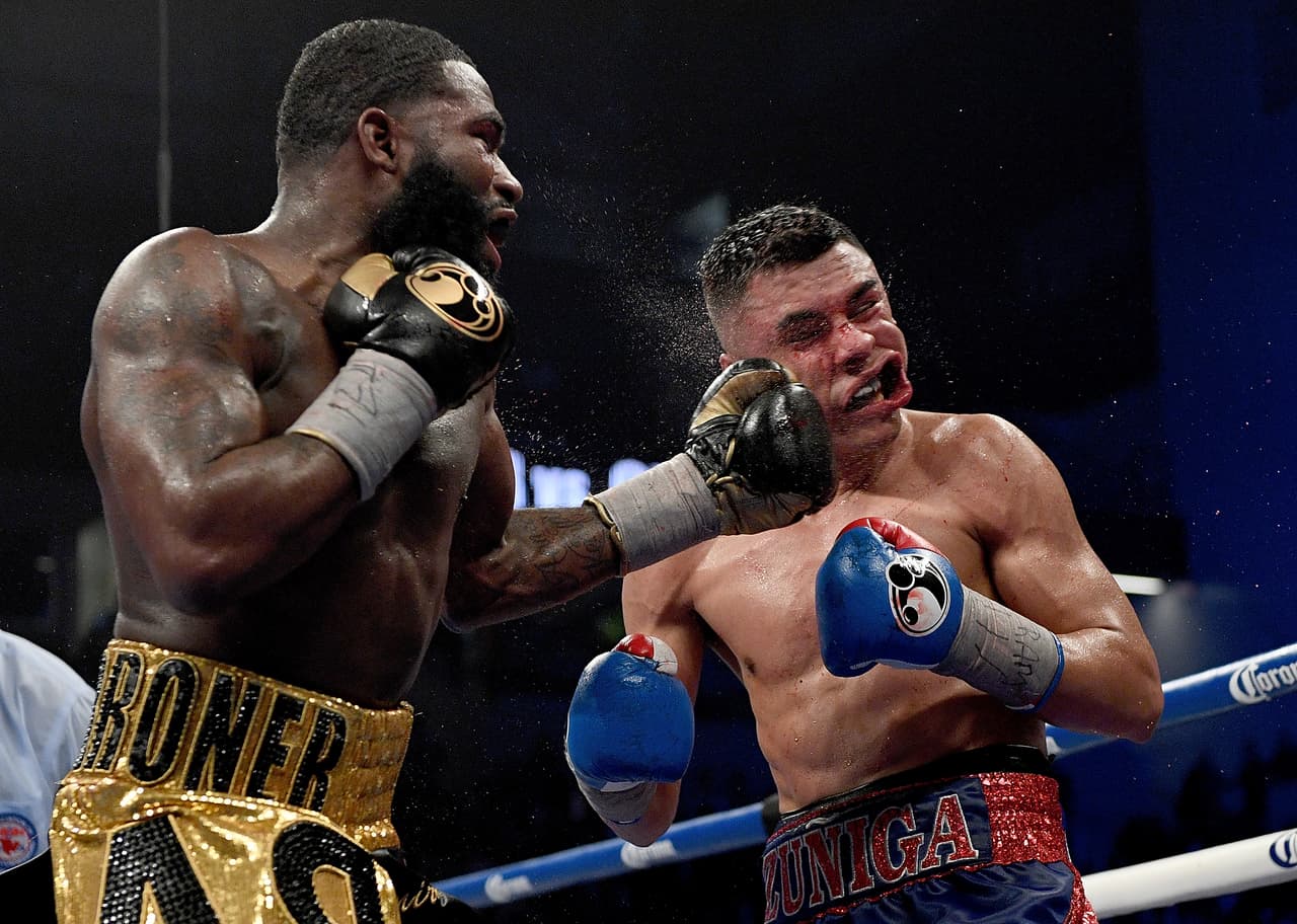 CINCINNATI, OH - FEBRUARY 18: Adrian Broner, left, hits Adrian Granados during their fight at Centas Center on February 18, 2017 in Cincinnati, Ohio. (Photo by Bobby Ellis/Getty Images)