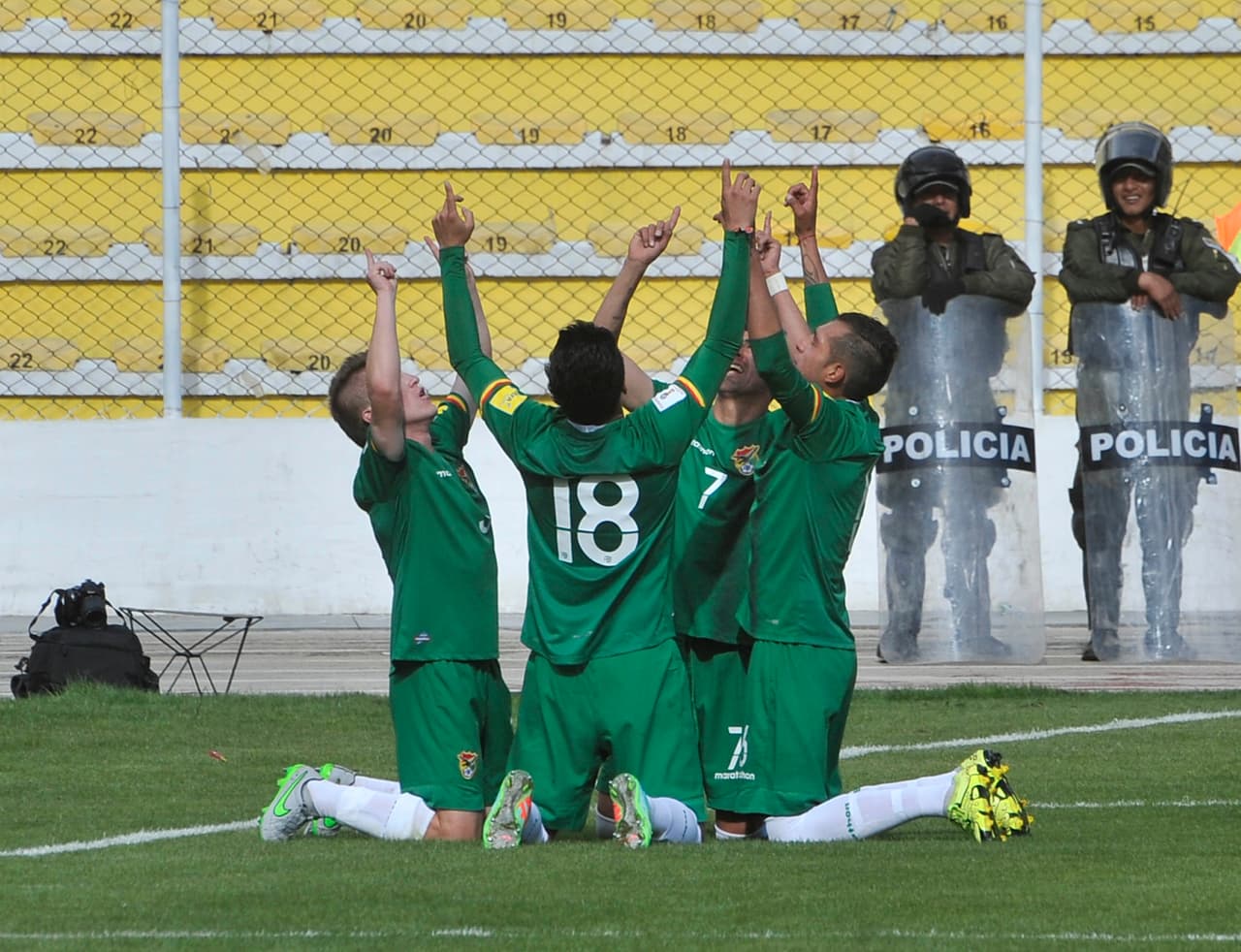 LA PAZ, BOLIVIA - NOVEMBER 12: Juan Carlos Arce of Bolivia celebrates with teammates after scoring the second goal of his team during a match between Bolivia and Venezuela as part of FIFA 2018 World Cup Qualifiers at Hernando Siles Stadium on November 12, 2015 in La Paz, Bolivia. (Photo by Javier Mamani/LatinContent/Getty Images)