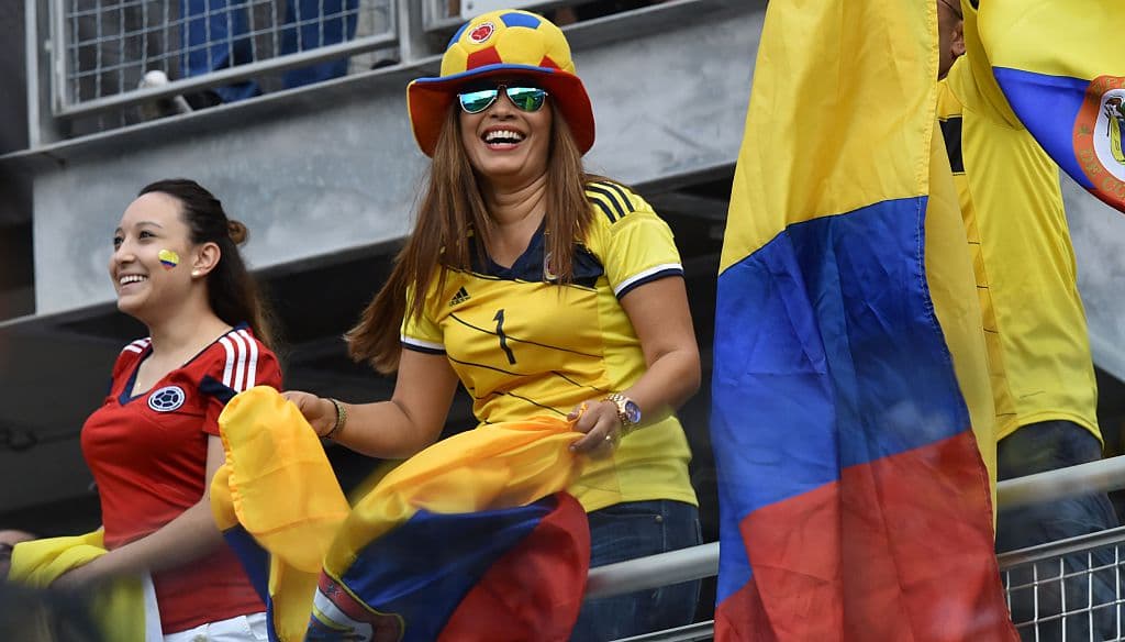 Fans of Colombia cheer for their team before the start of the Copa America Centenario semifinal football match against Chile, in Chicago, Illinois, United States, on June 22, 2016. / AFP / Nicholas Kamm (Photo credit should read NICHOLAS KAMM/AFP/Getty Images)