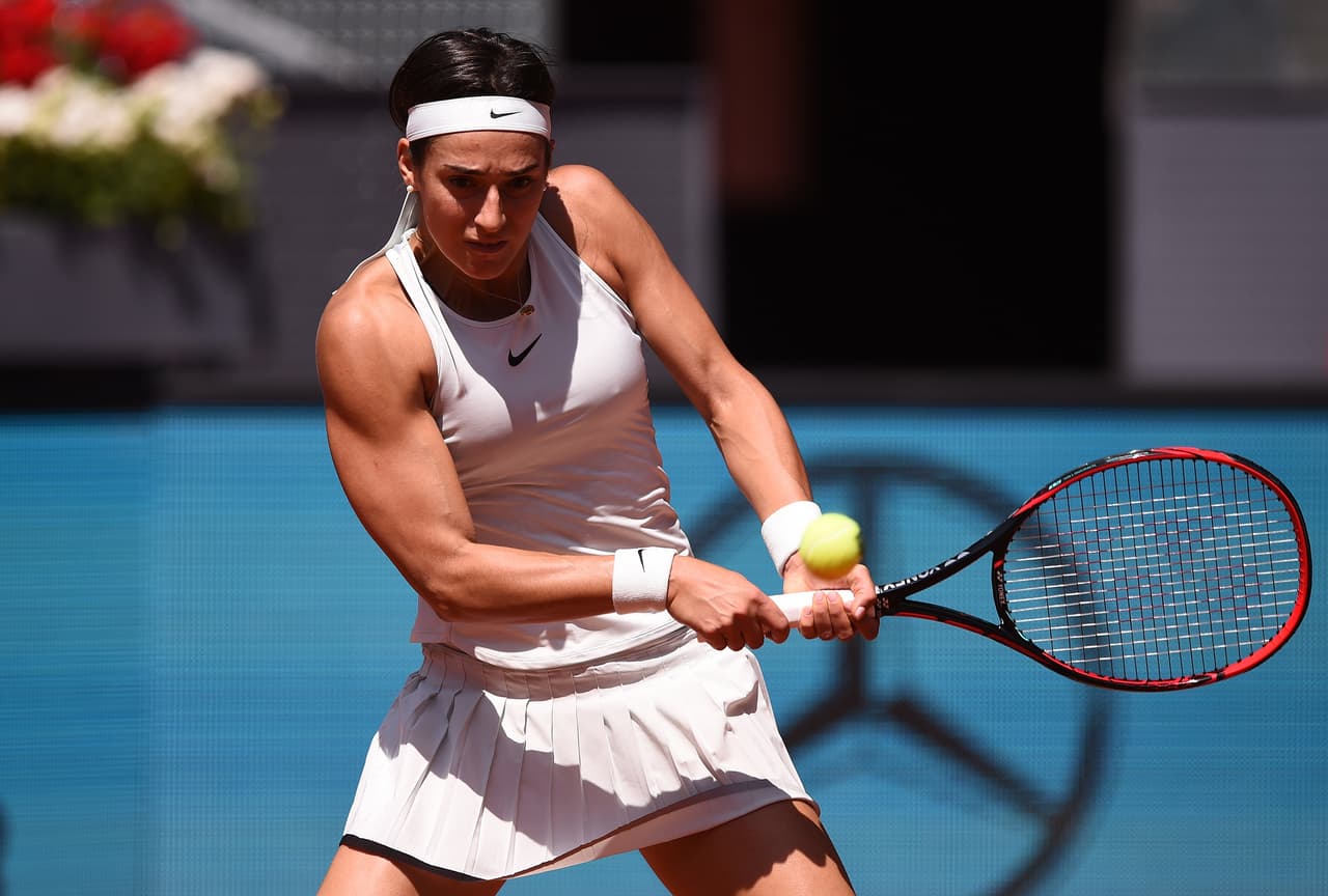 Entre las mujeres, la francesa Caroline García derrotó 6-2, 6-3 a la española Carla Suárez Navarro.