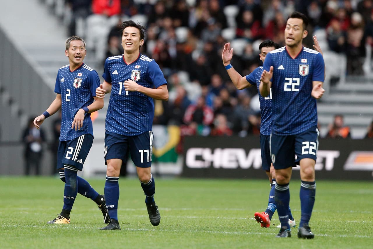 Se daban ánimos los jugadores asiáticos, que al final no encontrarían el camino a otro gol.