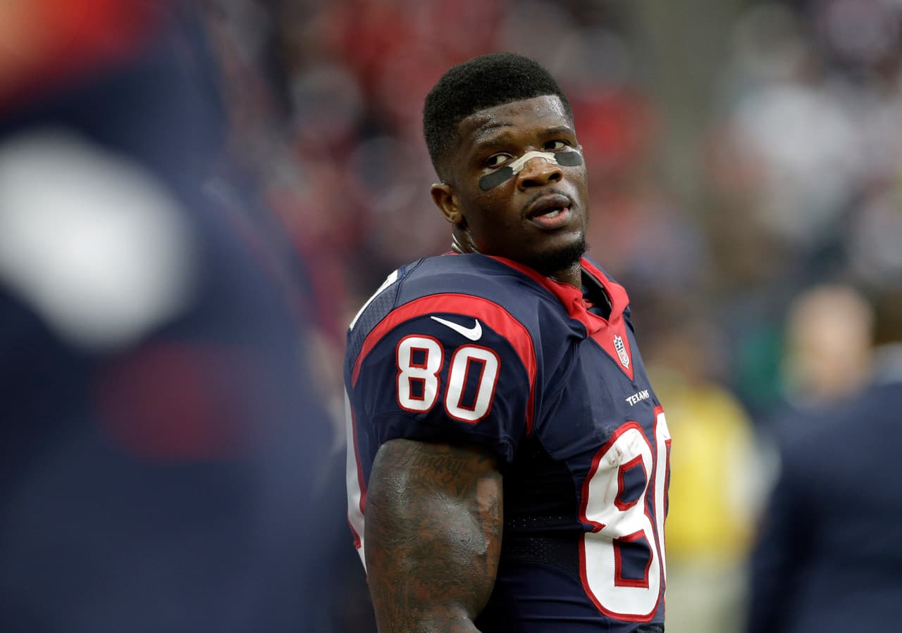 Houston Texans wide receiver Andre Johnson (80) stands on the sidelines during the first half of an NFL football game against the Baltimore Ravens Sunday, Dec. 21, 2014, in Houston. (AP Photo/Patric Schneider)