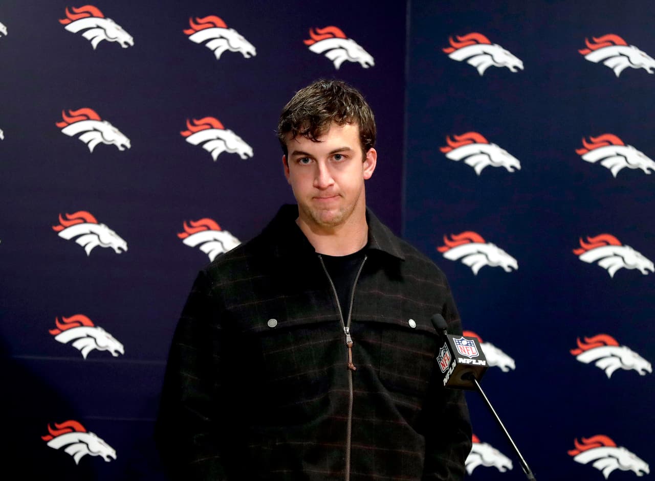 Denver Broncos quarterback Trevor Siemian speak after an NFL football game against the Kansas City Chiefs, Sunday, Nov. 27, 2016, in Denver. The Chiefs won 30-27 in overtime. (AP Photo/Jack Dempsey)