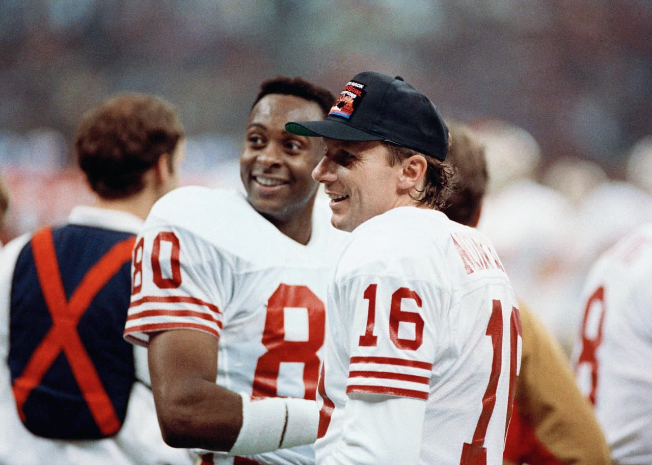 Una de las duplas más impresionantes que ha visto el deporte en la historia, Joe Montana y Jerry Rice, ídolos y leyendas de lo San Francisco 49ers.