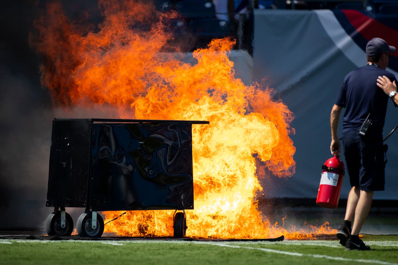 NASHVILLE, TN - SEPTEMBER 15: A failed pyrotechnic device bursts into flames before the game between the Tennessee Titans and the Indianapolis Colts at Nissan Stadium on September 15, 2019 in Nashville, Tennessee. (Photo by Brett Carlsen/Getty Images)