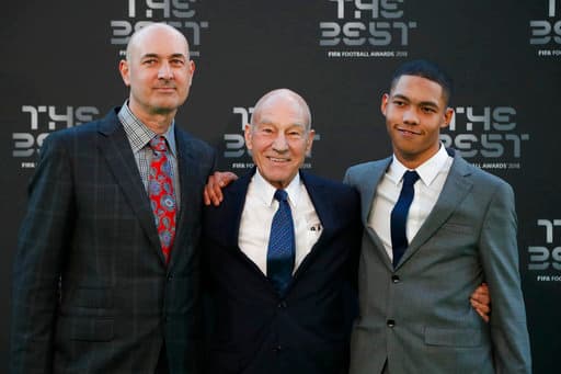 Actor Jean-Luc Picard of Star Trek, center, arrives for the ceremony of the Best FIFA Football Awards in the Royal Festival Hall in London, Britain, Monday, Sept. 24, 2018. (AP Photo/Frank Augstein)