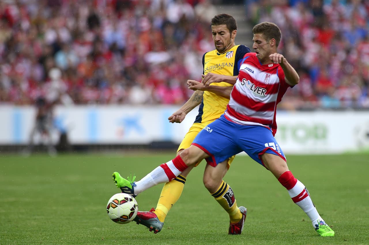 Granada y Atlético empataron un partido que les ayuda a cumplir objetivos.