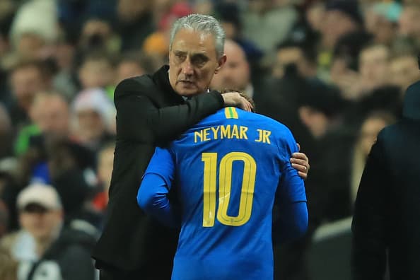 MILTON KEYNES, ENGLAND - NOVEMBER 20: Neymar of Brazil is embraced by Tite manager of Brazil as he goes off injured early in the game during the International Friendly match between Brazil and Cameroon at Stadium mk on November 20, 2018 in Milton Keynes, England. (Photo by Marc Atkins/Offside/Getty Images)