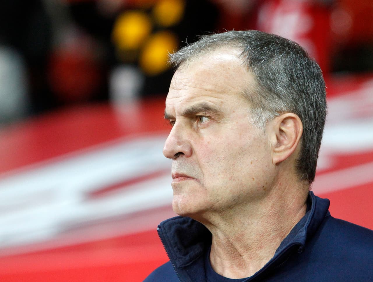 FILE - In this Oct. 29, 2017 file photo, Marcelo Bielsa looks on during their French League one soccer match against Marseille at the Lille Metropole stadium, in Villeneuve d'Ascq, northern France. English second-tier club Leeds has been accused by a rival of having an employee spy on its training session ahead of a league match. Derby County says police were called to its training center following reports of a man "acting suspiciously outside the premises." Derby said the man works for the "footballing staff at Leeds" and that it would hold talks with Leeds. Leeds is managed by Argentine coach Marcelo Bielsa, who is known for his meticulous planning and attention to detail. (AP Photo/Michel Spingler, File)