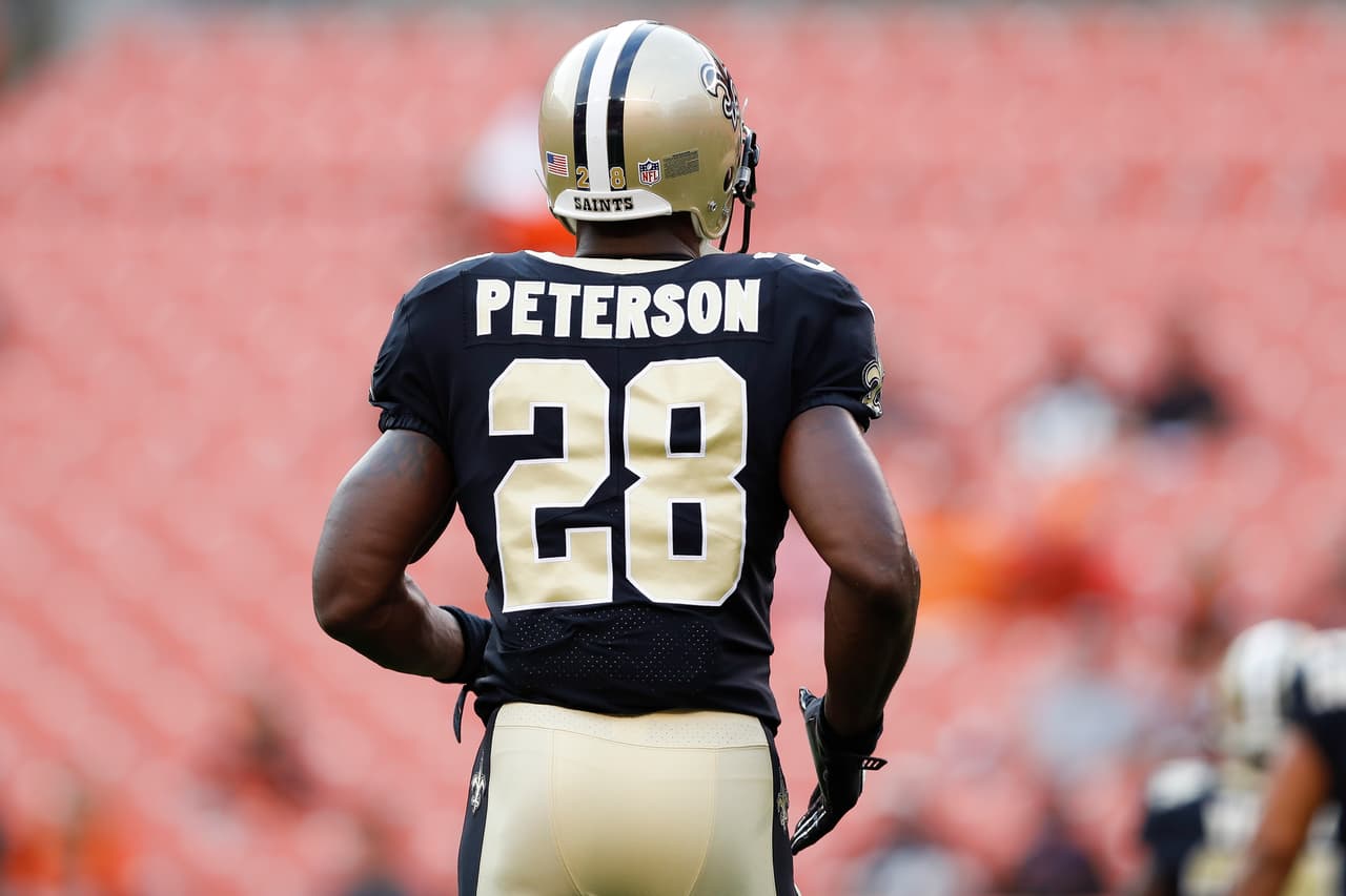 New Orleans Saints running back Adrian Peterson (28) looks on prior to an NFL football game against the Cleveland Browns on Thursday, Aug. 10, 2017 in Cleveland. Cleveland won 20-14. (Aaron M. Sprecher via AP)