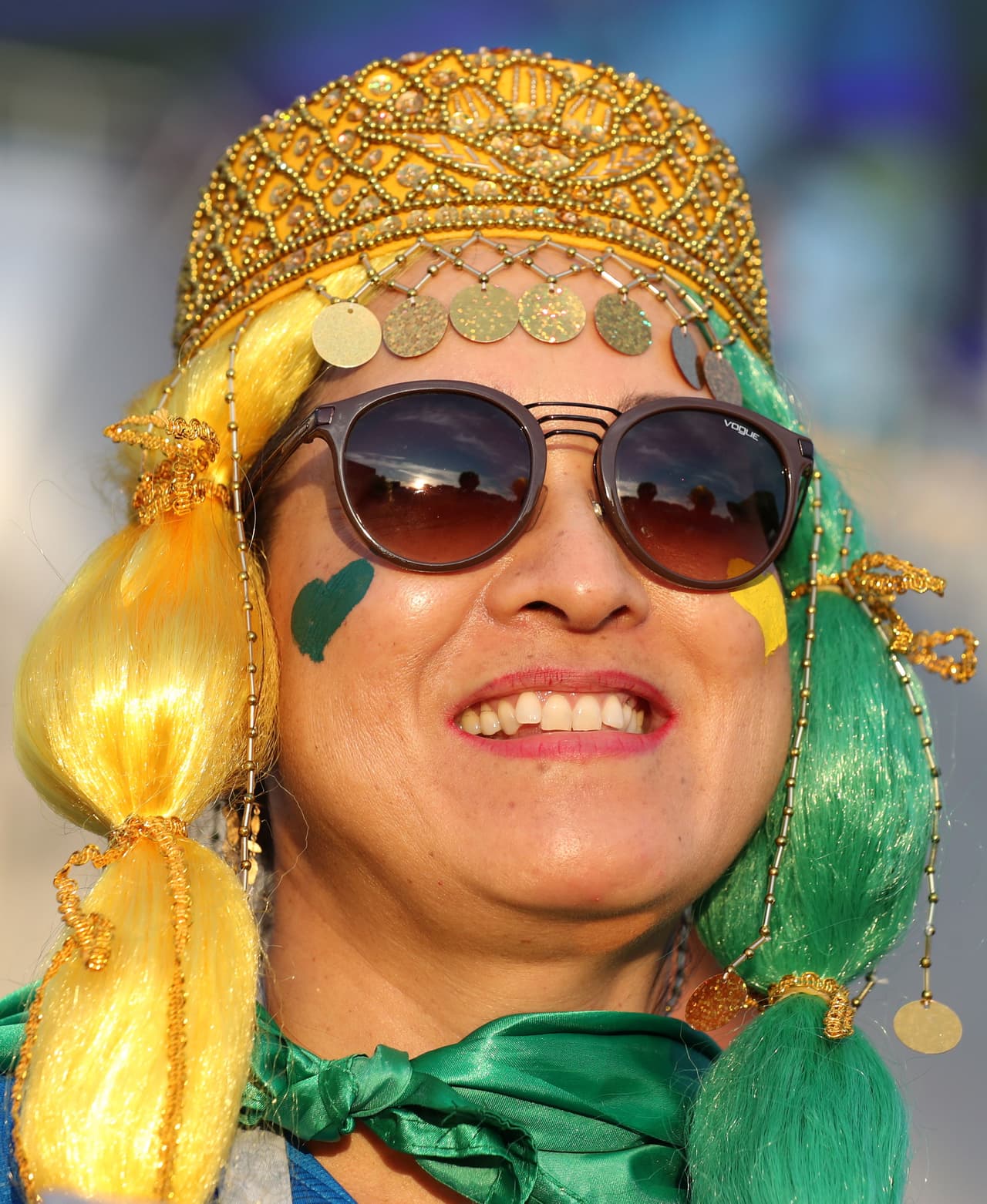 Kazan (Russian Federation), 06/07/2018.- Supporter of Brazil arrives for the FIFA World Cup 2018 quarter final soccer match between Brazil and Belgium in Kazan, Russia, 06 July 2018. (RESTRICTIONS APPLY: Editorial Use Only, not used in association with any commercial entity - Images must not be used in any form of alert service or push service of any kind including via mobile alert services, downloads to mobile devices or MMS messaging - Images must appear as still images and must not emulate match action video footage - No alteration is made to, and no text or image is superimposed over, any published image which: (a) intentionally obscures or removes a sponsor identification image; or (b) adds or overlays the commercial identification of any third party which is not officially associated with the FIFA World Cup) (Mundial de Fútbol, Bélgica, Brasil, Rusia) EFE/EPA/TATYANA ZENKOVICH EDITORIAL USE ONLY
