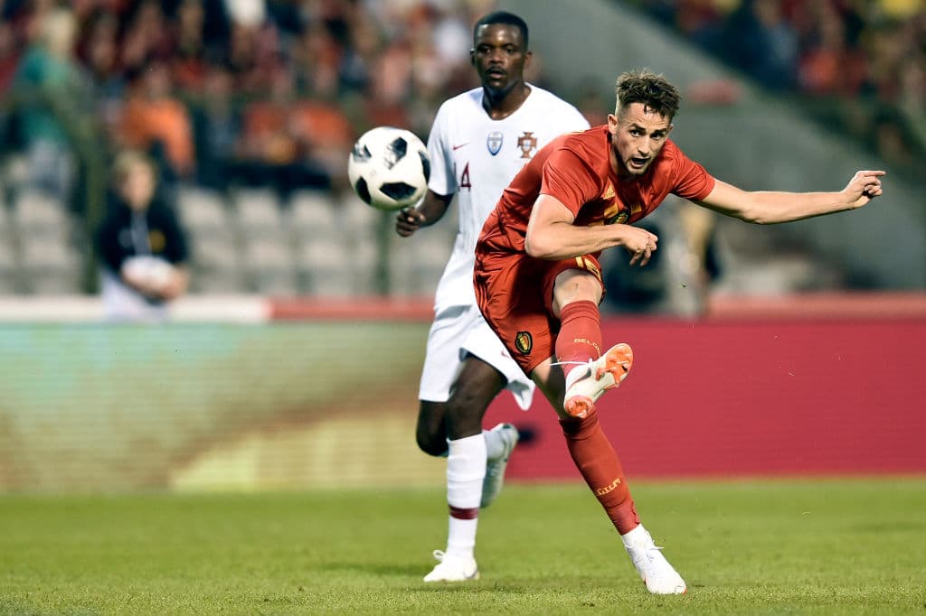 Belgium's midfielder Adnan Januzaj (R) kicks the ball during the friendly football match between Belgium and Portugal, on June 2, 2018 at the King Baudouin stadium in Brussels. (Photo by JOHN THYS / AFP) (Photo credit should read JOHN THYS/AFP/Getty Images)