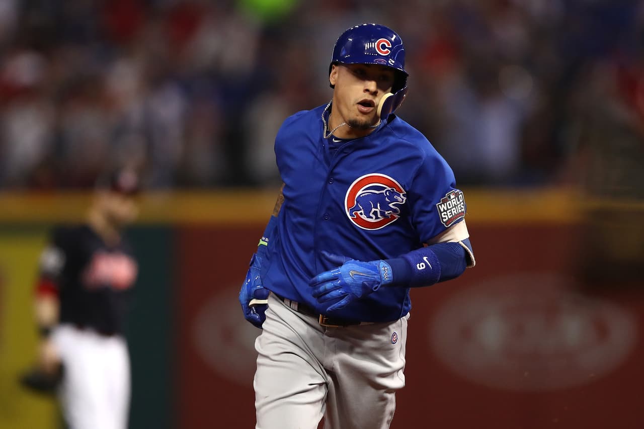 CLEVELAND, OH - NOVEMBER 02: Javier Baez #9 of the Chicago Cubs runs the bases after hitting a solo home run during the fifth inning against the Cleveland Indians in Game Seven of the 2016 World Series at Progressive Field on November 2, 2016 in Cleveland, Ohio. (Photo by Elsa/Getty Images)