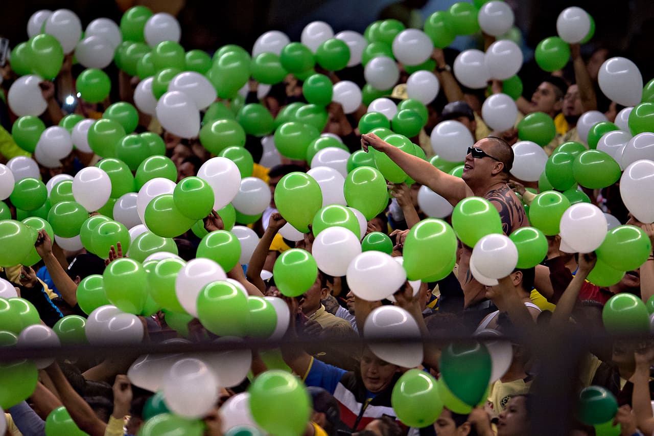 Las porras americanistas se pintaron de verde y blanco en honor al Chapecoense.