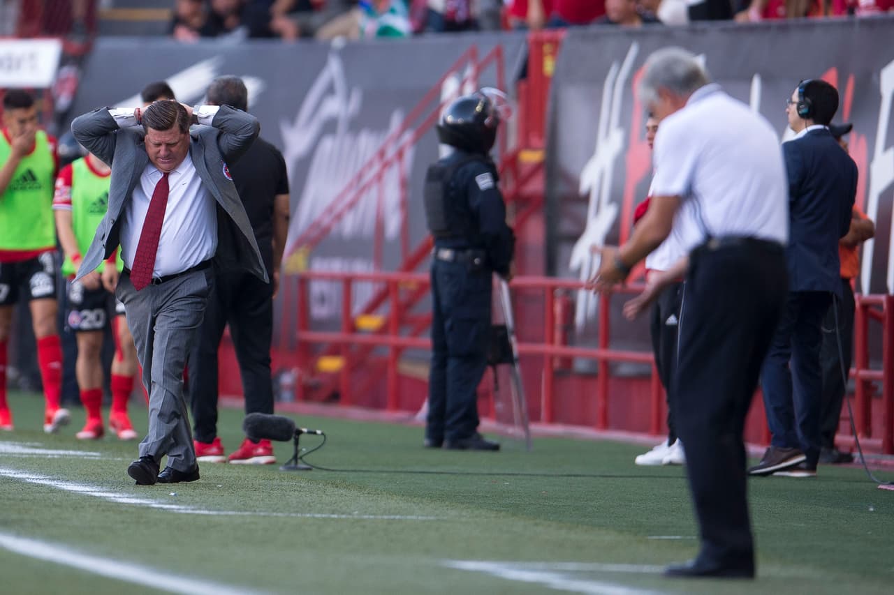 Una imagen vale más que mil palabras. El "Piojo" y "Tuca" Ferretti viviendo el encuentro como sólo ellos saben, al límite de las emociones.
