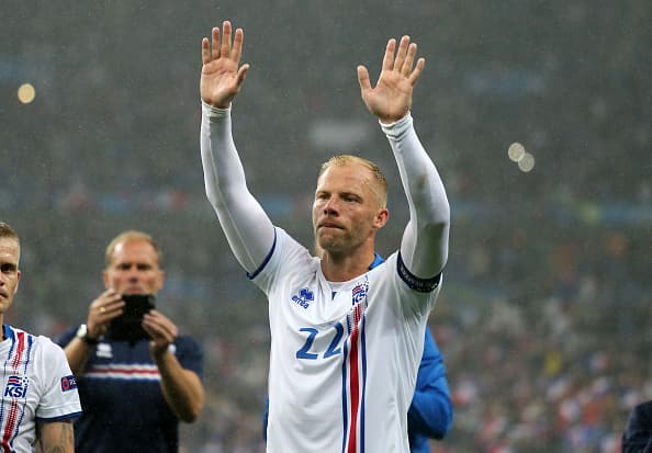PARIS, FRANCE - JULY 03: Eidur Gudjohnsen of Iceland salutes the Iceland fans at full time after the UEFA Euro 2016 quarter final match between France and Iceland at Stade de France on July 3, 2016 in Paris, France. (Photo by Matthew Ashton - AMA/Getty Images)