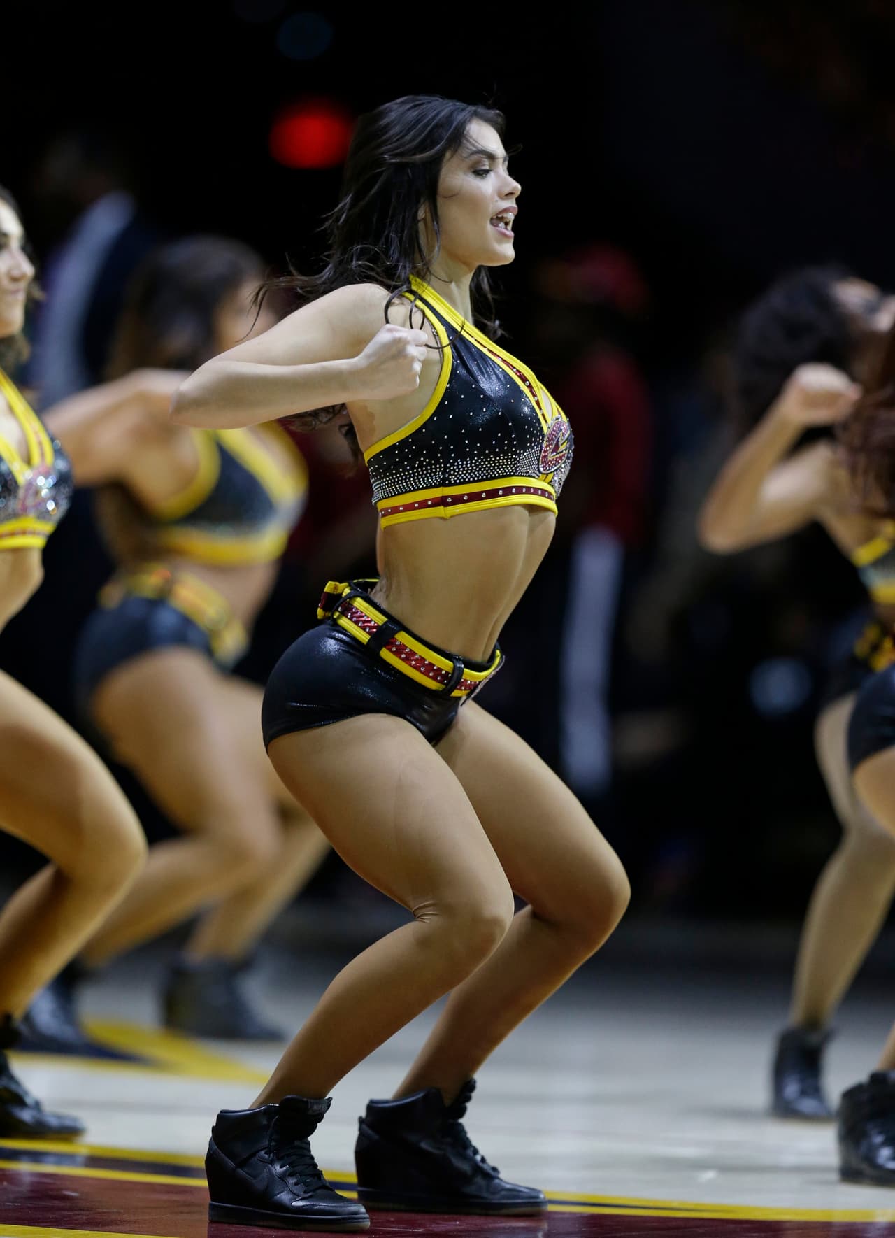 A Cleveland Cavaliers cheerleader performs in the first half of an NBA basketball game between the Boston Celtics and the Cleveland Cavaliers, Thursday, Dec. 29, 2016, in Cleveland. (AP Photo/Tony Dejak)