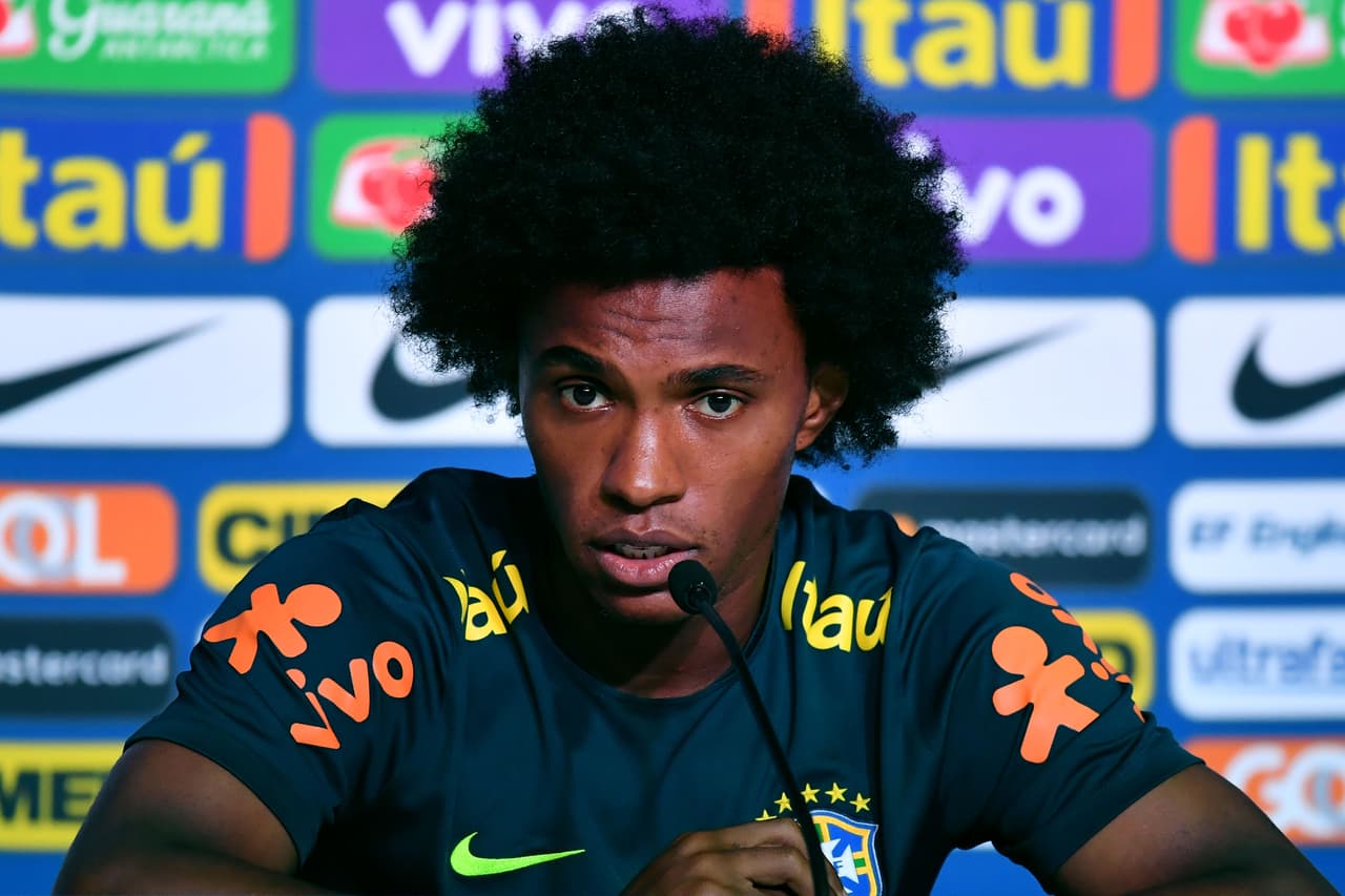 Brazil's forward Willian looks on during a press conference at Yug Sport Stadium, in Sochi, on July 4, 2018, during the Russia 2018 World Cup football tournament. (Photo by NELSON ALMEIDA / AFP) (Photo credit should read NELSON ALMEIDA/AFP/Getty Images)