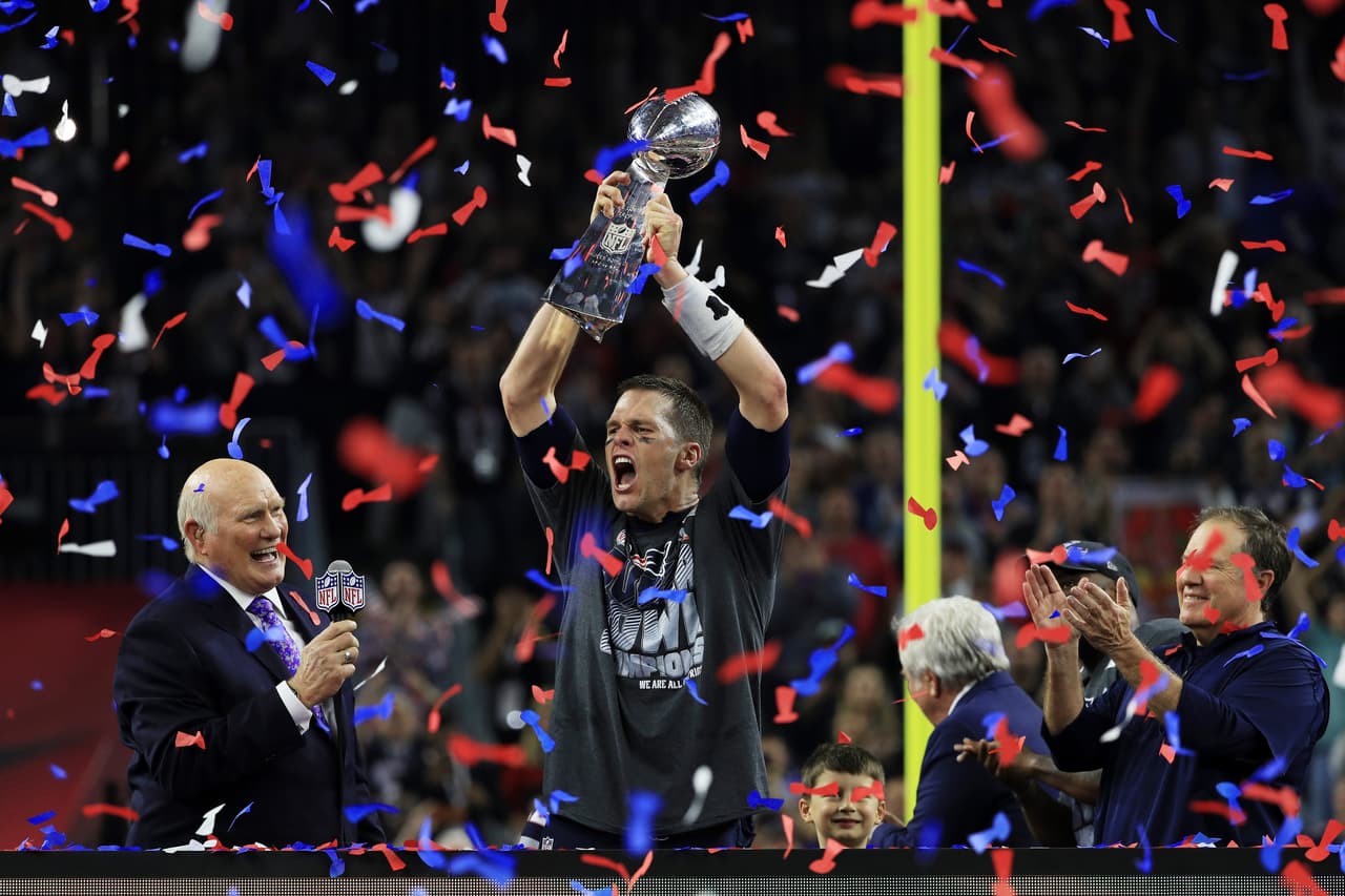 HOUSTON, TX - FEBRUARY 05: Tom Brady #12 of the New England Patriots holds the Vince Lombardi Trophy after defeating the Atlanta Falcons 34-28 during Super Bowl 51 at NRG Stadium on February 5, 2017 in Houston, Texas. (Photo by Mike Ehrmann/Getty Images)