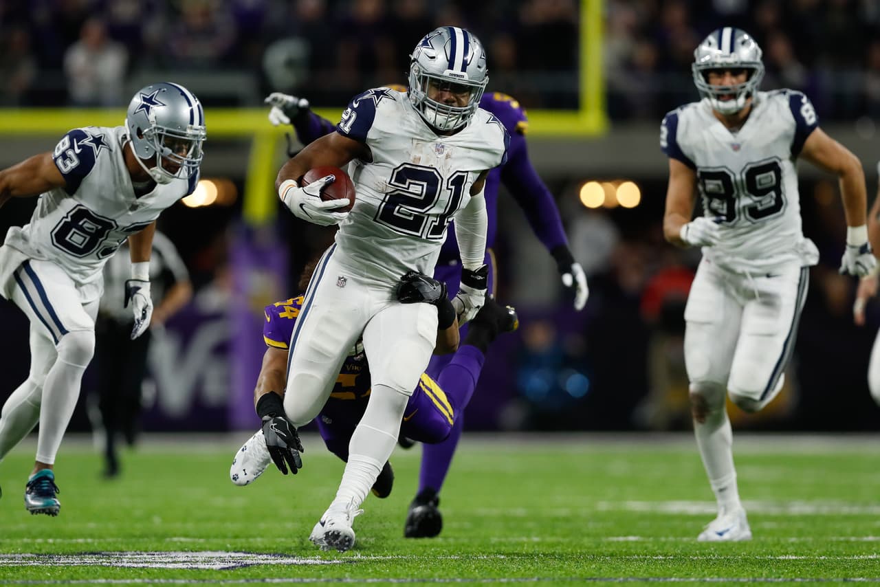 Dallas Cowboys running back Ezekiel Elliott (21) carries the ball during an NFL football game against the Minnesota Vikings on Thursday, Dec. 1, 2016, in Minneapolis. Dallas won 17-15. (Aaron M. Sprecher via AP)