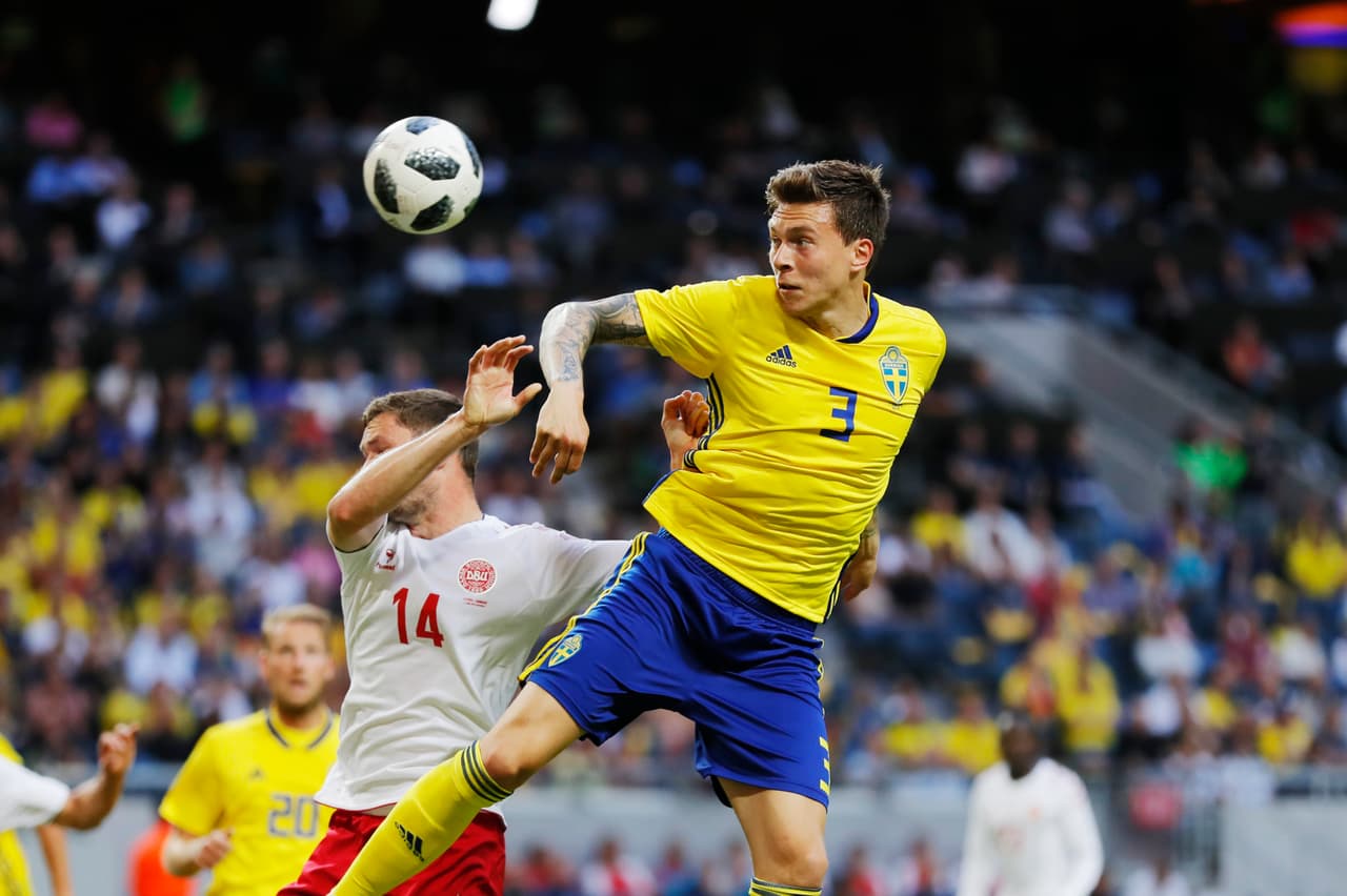 STOCKHOLM, SWEDEN - JUNE 02: Henrik Dalsgaard of Denmark and Victor Nilsson Lindelof of Sweden competes for the ball during the International Friendly match between Sweden and Denmark at Friends Arena on June 2, 2018 in Solna, Sweden. (Photo by Nils Petter Nilsson/Ombrello/Getty Images)