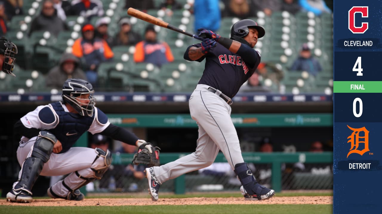 Carlos Santana #41 of the Cleveland Indians hits as seventh inning RBI single in front of Grayson Greiner #17 of the Detroit Tigers at Comerica Park on April 11, 2019.