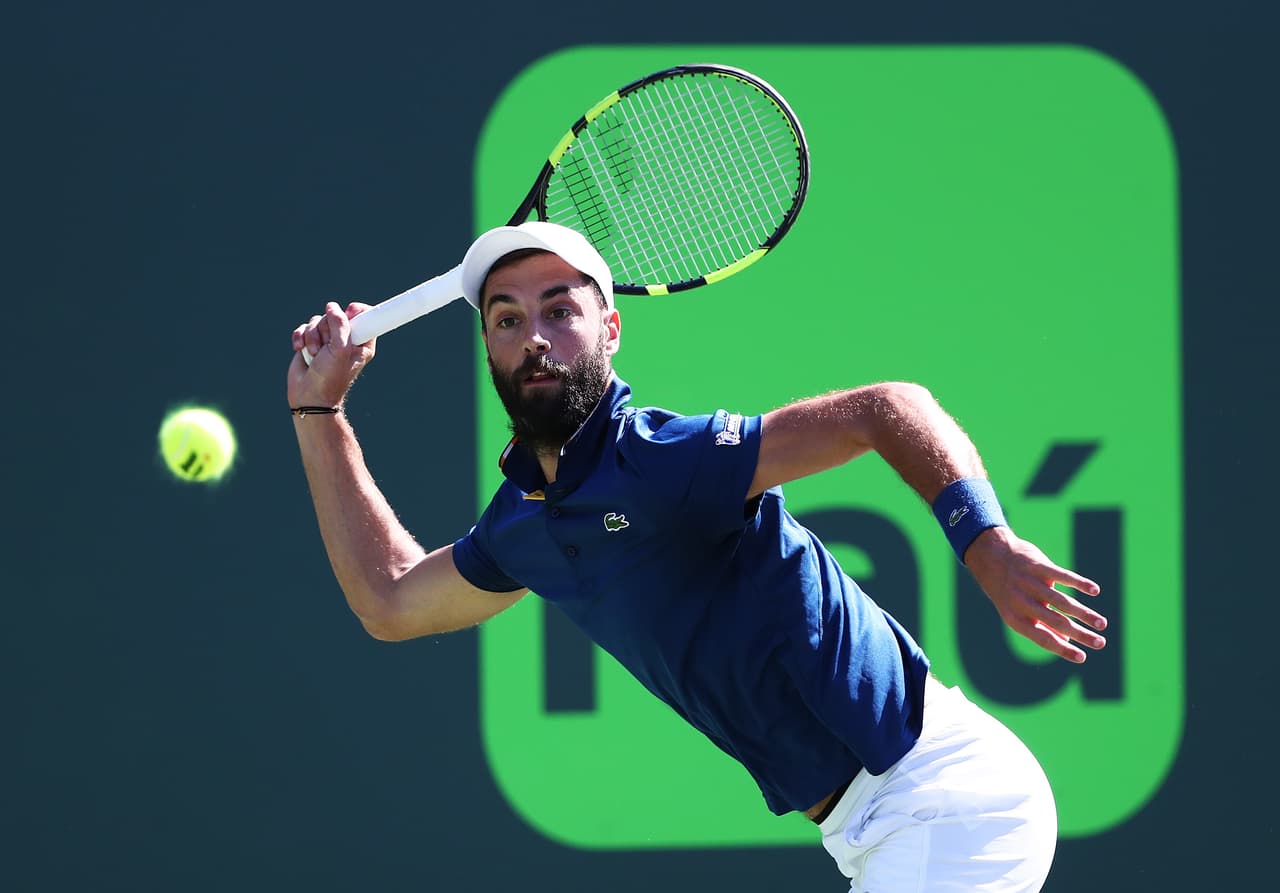 KEY BISCAYNE, FL - MARCH 23: Benoit Paire of France plays a shot against Novak Djokovic of Serbia during Day 5 of the Miami Open at the Crandon Park Tennis Center on March 23, 2018 in Key Biscayne, Florida. (Photo by Al Bello/Getty Images)