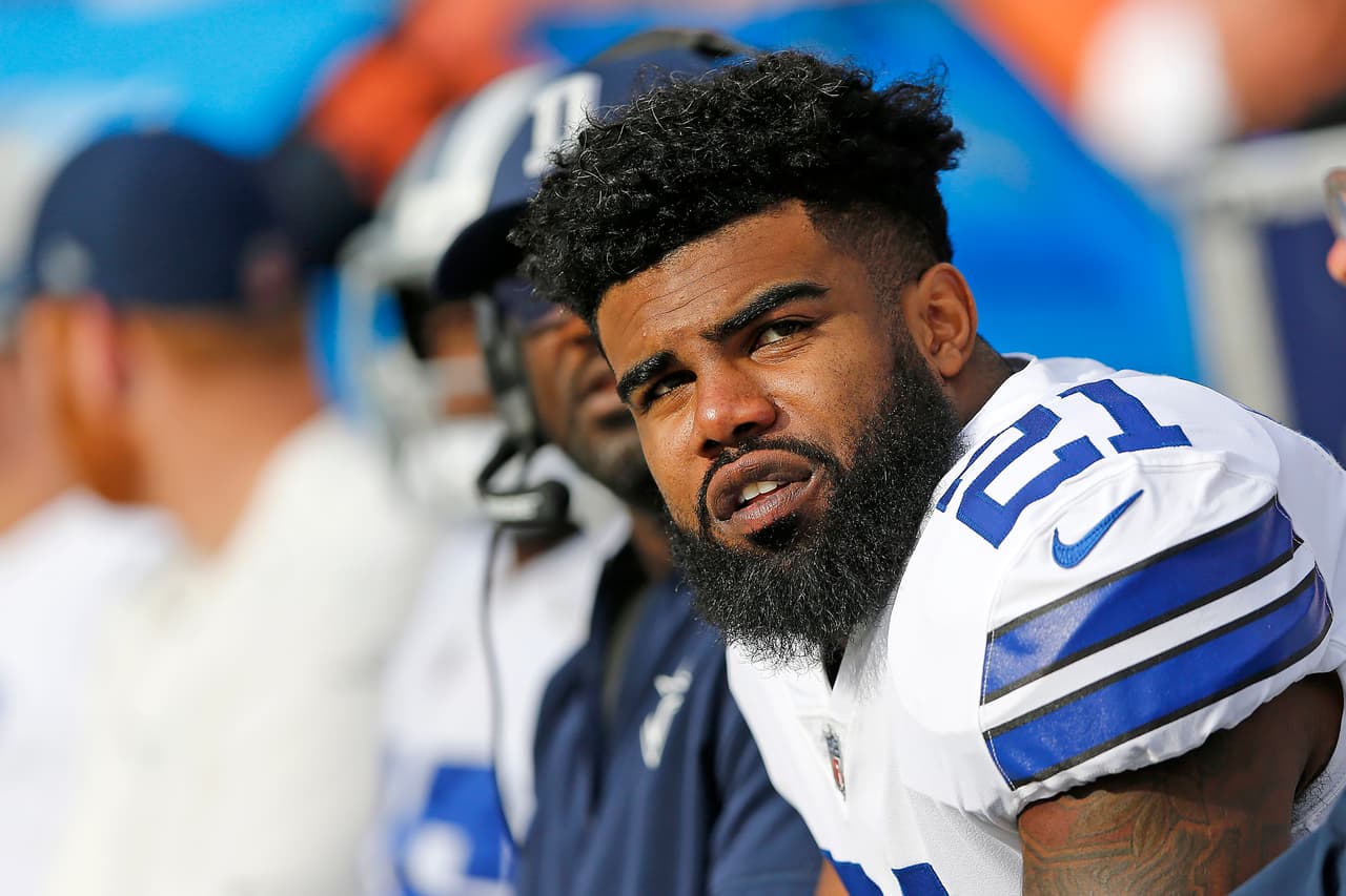 Dallas Cowboys running back Ezekiel Elliott (21) on the bench during a 2017 NFL week 2 regular season game against the Denver Broncos, Sunday, Sept. 17, 2017 in Denver. The Broncos defeated the Cowboys, 42-17. (James D. Smith via AP)