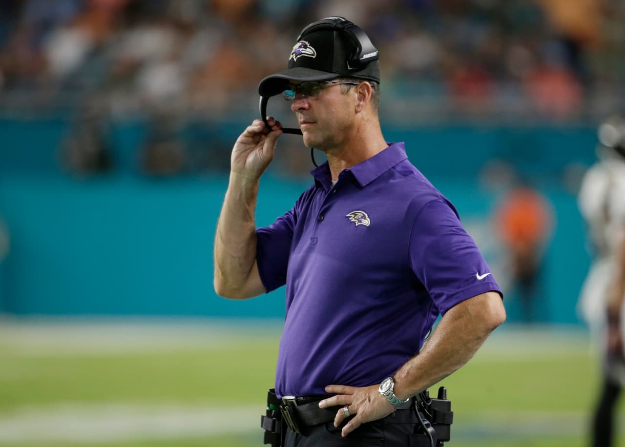 Baltimore Ravens head coach John Harbaugh watched the game, during the first half of an NFL preseason football game against the Miami Dolphins, Thursday, Aug. 17, 2017, in Miami Gardens, Fla. (AP Photo/Lynne Sladky)