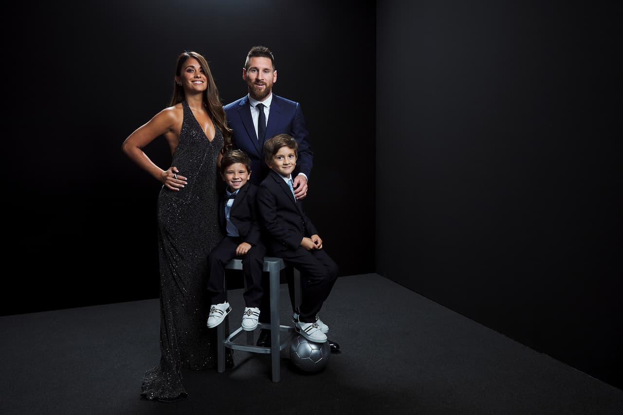 MILAN, ITALY - SEPTEMBER 23: The Best FIFA Men's Player Award Lionel Messi of FC Barcelona and Argentina poses for a portrait with wife Antonella Roccuzzo and sons Mateo and Ciro in the photo booth prior to The Best FIFA Football Awards 2019 at Excelsior Hotel Gallia on September 23, 2019 in Milan, Italy. (Photo by Michael Regan - FIFA/FIFA via Getty Images)