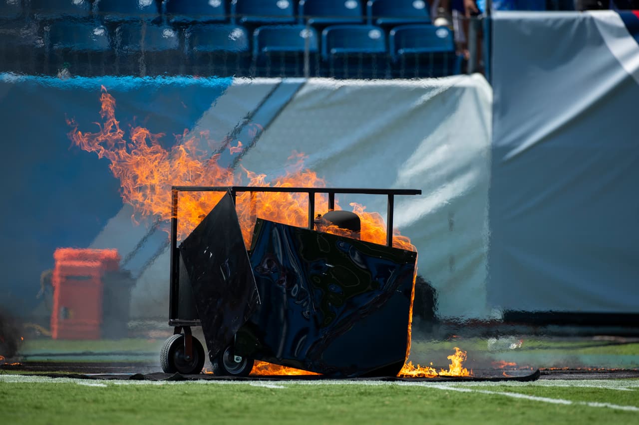 NASHVILLE, TN - SEPTEMBER 15: A failed pyrotechnic device bursts into flames before the game between the Tennessee Titans and the Indianapolis Colts at Nissan Stadium on September 15, 2019 in Nashville, Tennessee. (Photo by Brett Carlsen/Getty Images)