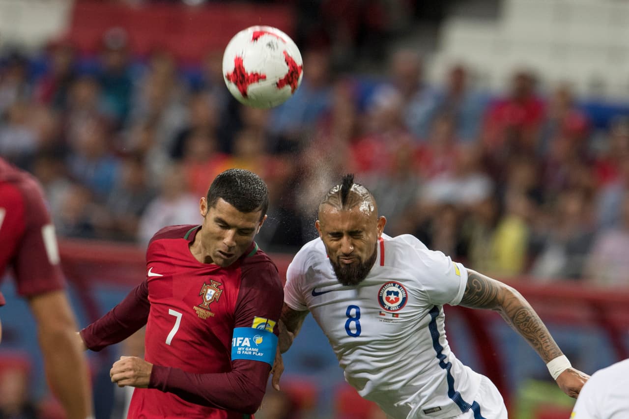 Action photo during the match Portugal vs Chile corresponding Semifinals to the FIFA Confederations Cup Russia 2017 at Kazan Arena Stadium, Russia. Foto de accion durante el partido Portugal vs Chile, Correspondiente a las Semifinales de la Copa FIFA Confederaciones Rusia 2017 en el Estadio de Arena Kazan, Rusia, en la foto: Cristiano Ronaldo Portugal y Arturo Vidal Chile 28/06/2017/MEXSPORT/Jorge Martinez