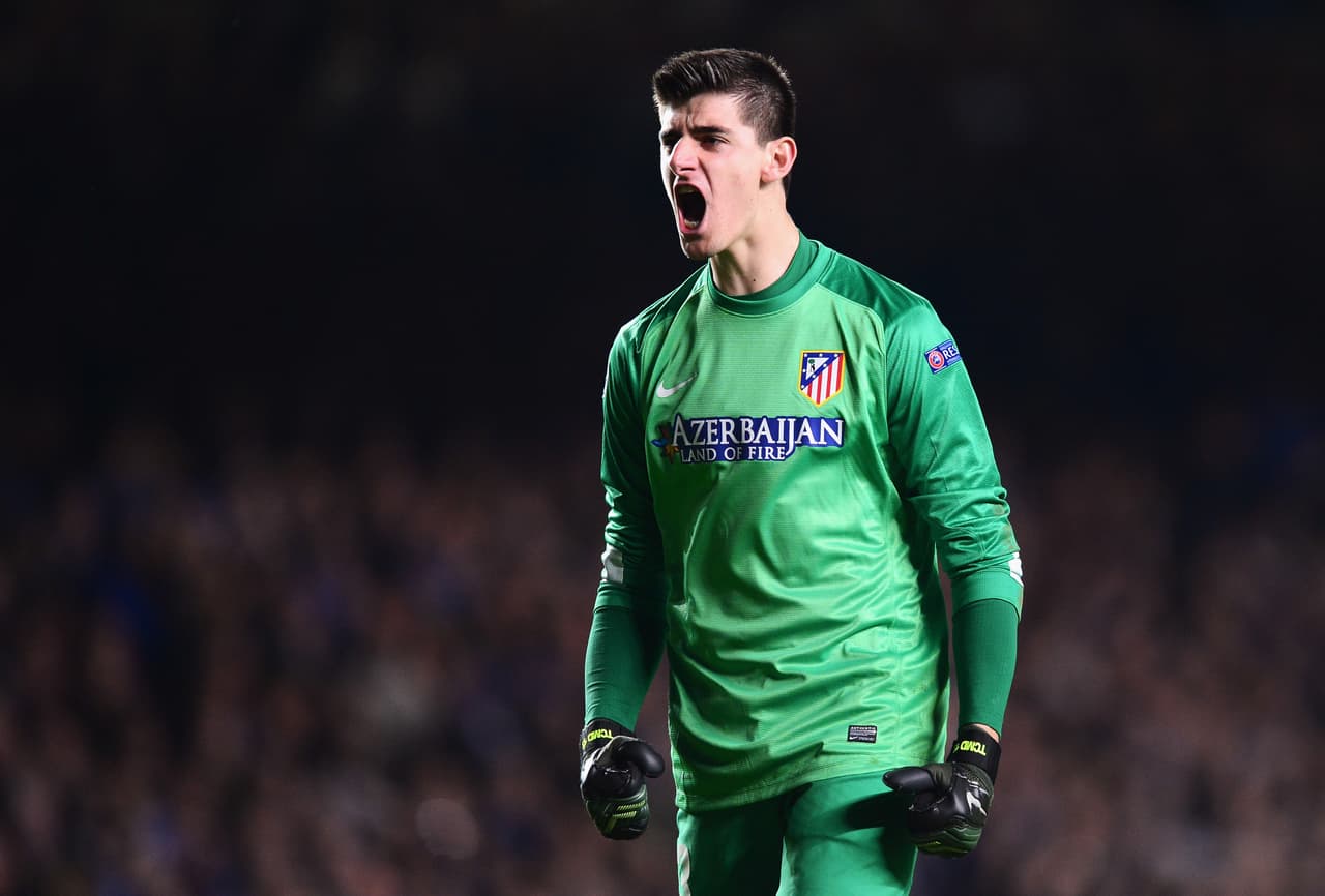 LONDON, ENGLAND - APRIL 30: Goalkeeper Thibaut Courtois of Club Atletico de Madrid celebrates a goal during the UEFA Champions League semi-final second leg match between Chelsea and Club Atletico de Madrid at Stamford Bridge on April 30, 2014 in London, England. (Photo by Jamie McDonald/Getty Images)