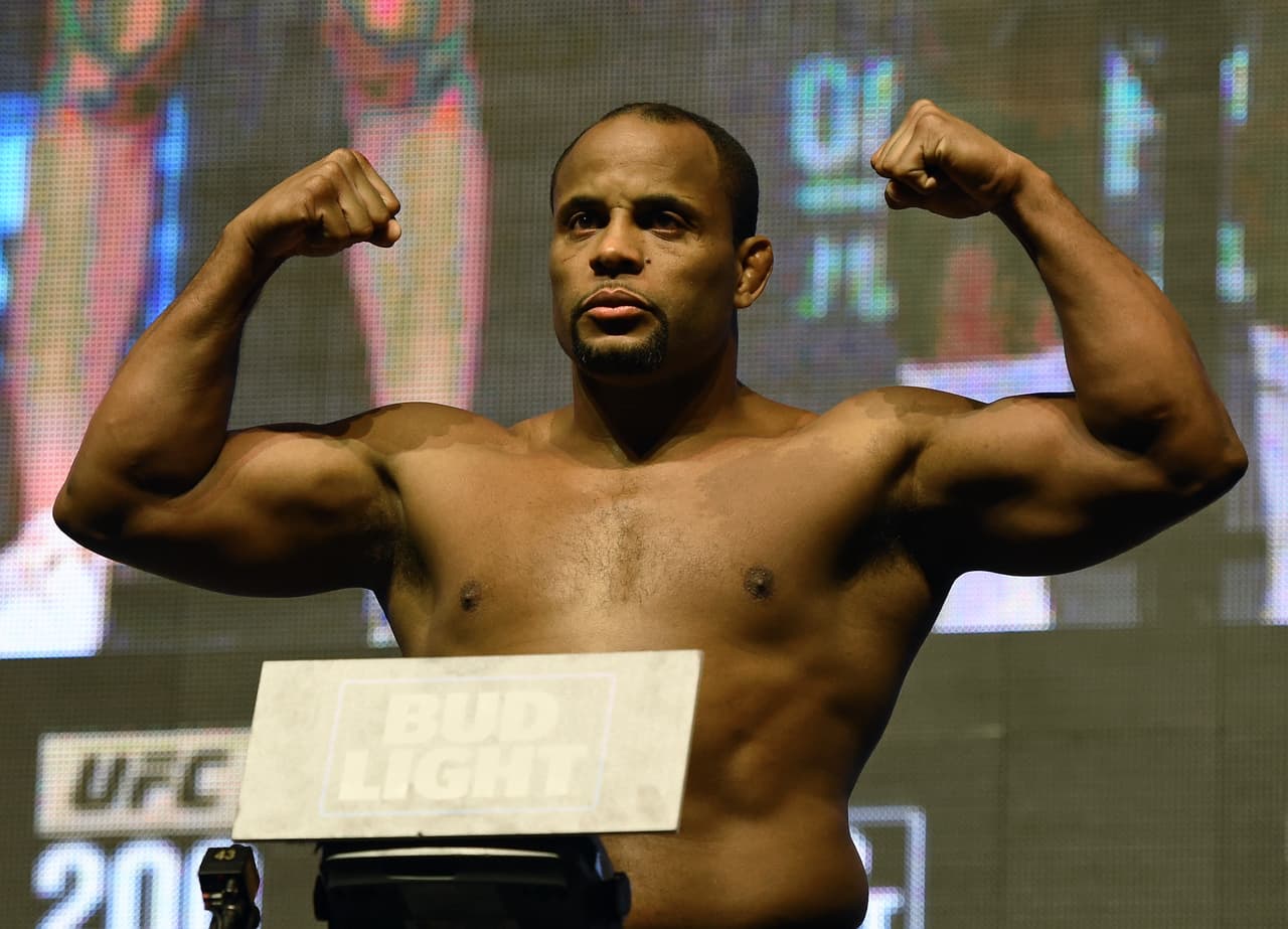 LAS VEGAS, NV - JULY 08: Mixed martial artist Daniel Cormier poses on the scale during his weigh-in for UFC 200 at T-Mobile Arena on July 8, 2016 in Las Vegas, Nevada. Cormier will meet Anderson Silva in a non-title light heavyweight bout on July 9 at T-Mobile Arena. Silva replaces Jon Jones who was pulled from a light heavyweight title fight against Cormier due to a potential violation of the UFC's anti-doping policy. (Photo by Ethan Miller/Getty Images)