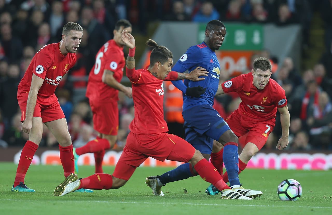 Henderson, Firmino y Milner marcando a Paul Pogba.