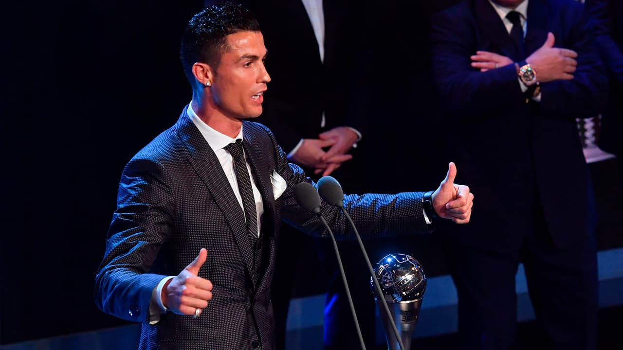 Real Madrid and Portugal forward Cristiano Ronaldo speaks after winning The Best FIFA Men's Player of 2017 Award during The Best FIFA Football Awards ceremony, on October 23, 2017 in London. / AFP PHOTO / Ben STANSALL (Photo credit should read BEN STANSALL/AFP/Getty Images)