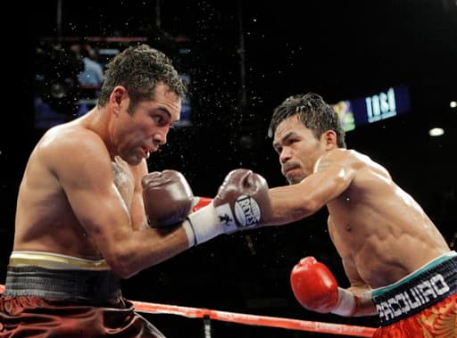 Pacquiao venía de pelear en 134 libras, peso ligero. Para la contienda contra el ‘Golden Boy’ subió a 142, peso welter, De la Hoya pesó 145. La pelea fue desigual, pero en favor del ‘Pac Man’, le dio una paliza a su rival y lo retiró definitivamente del pugilismo. (Texto: Geovany Guerrero)