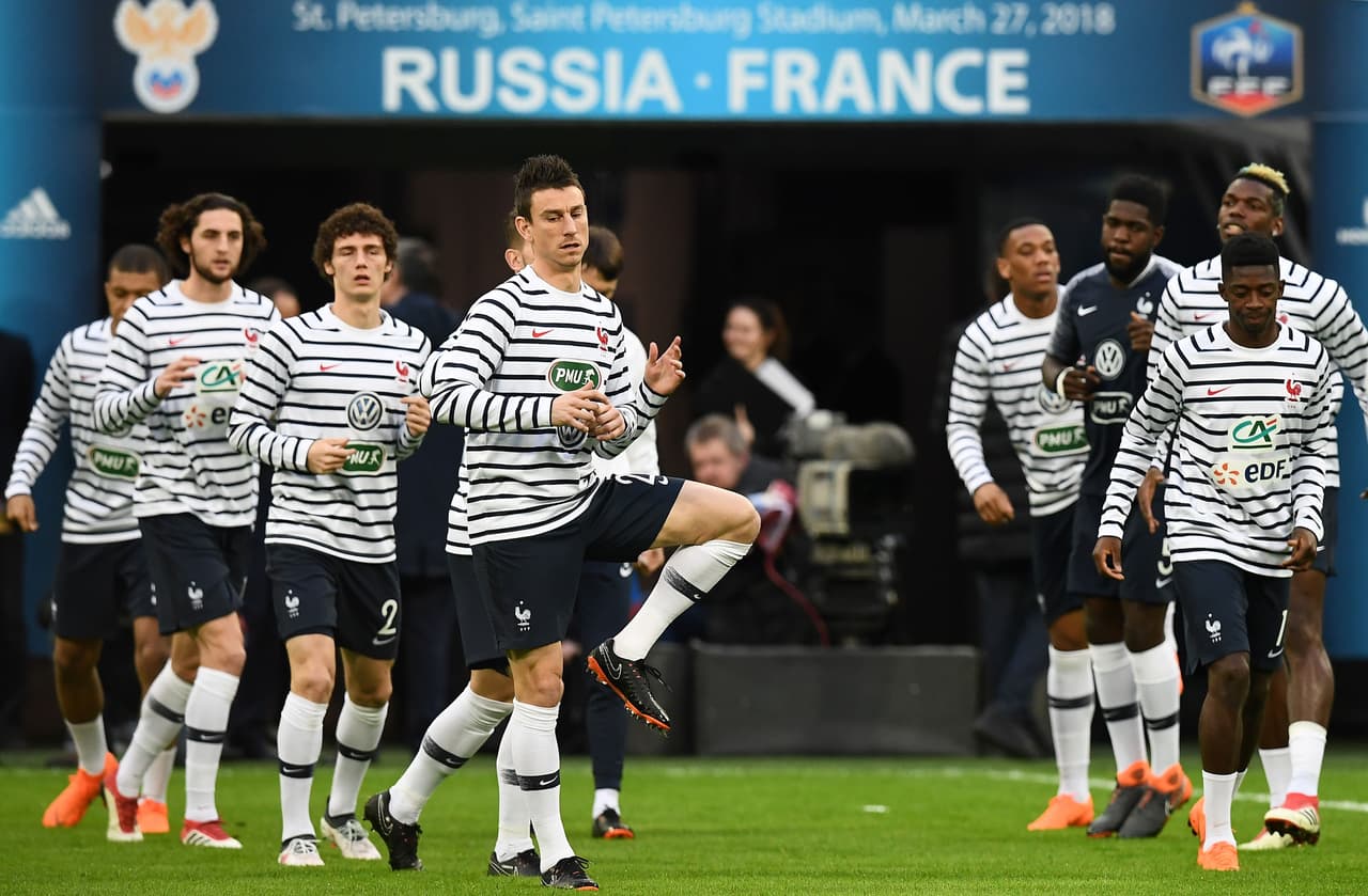 France's players warm up prior to an international friendly football match between Russia and France at the Saint Petersburg Stadium in Saint Petersburg on March 27, 2018. / AFP PHOTO / FRANCK FIFE (Photo credit should read FRANCK FIFE/AFP/Getty Images)