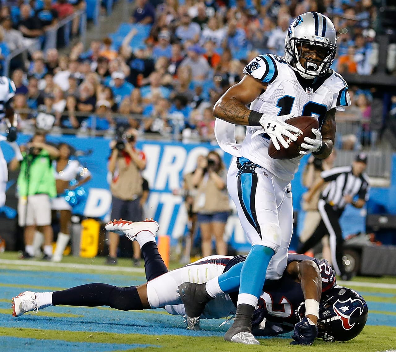 Carolina Panthers wide receiver Damiere Byrd (18) scores a touchdown in the end zone against Houston Texans defensive back Marcus Gilchrist (21) during the second half of an NFL preseason football game, Wednesday, Aug. 9, 2017, in Charlotte, N.C. (AP Photo/Jason E. Miczek)