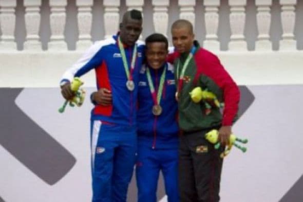 El equipo de Cuba continúa mostrando su poderío en el atletismo de los Juegos Centroamericanos y del Caribe Veracruz 2014, con el 1-2 de Ernesto Reve y Lázaro Martínez en la prueba de salto triple. (Foto: veracruz2014.mx).