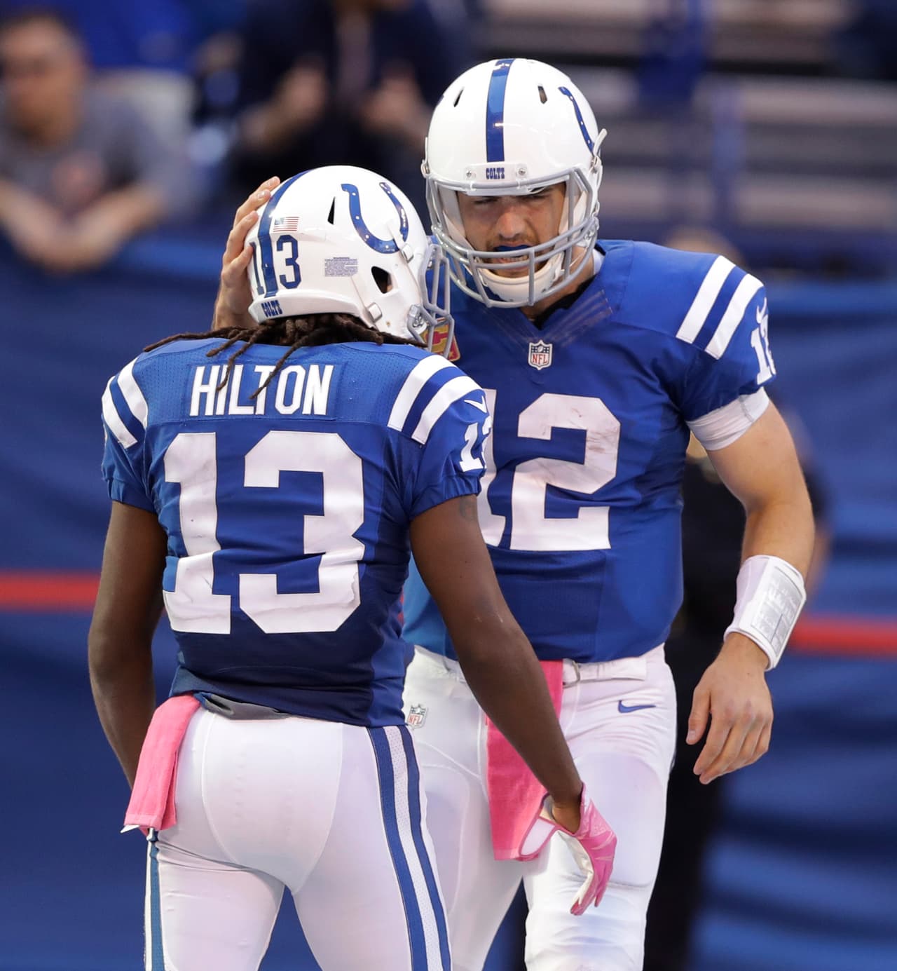 Indianapolis Colts wide receiver T.Y. Hilton (13) celebrates with quarterback Andrew Luck (12) after scoring a touchdown against the Chicago Bears during the second half of an NFL football game in Indianapolis, Sunday, Oct. 9, 2016. (AP Photo/Darron Cummings)